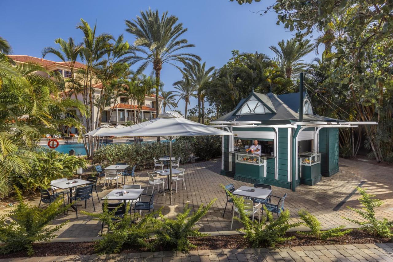 Lopesan Costa Meloneras Resort & Spa エクステリア 写真 The pool bar at the hotel